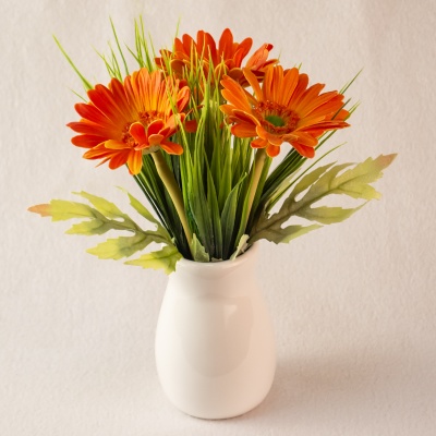 Композиция/цветы 091 Гербера оранжевый+осока/ваза капля 200х100х90